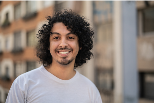 Image of man with curly hair