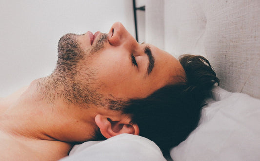 Man resting his head on a pillow