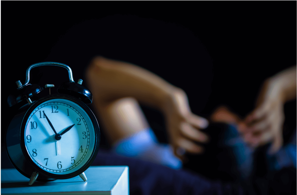 Image of man struggling to sleep